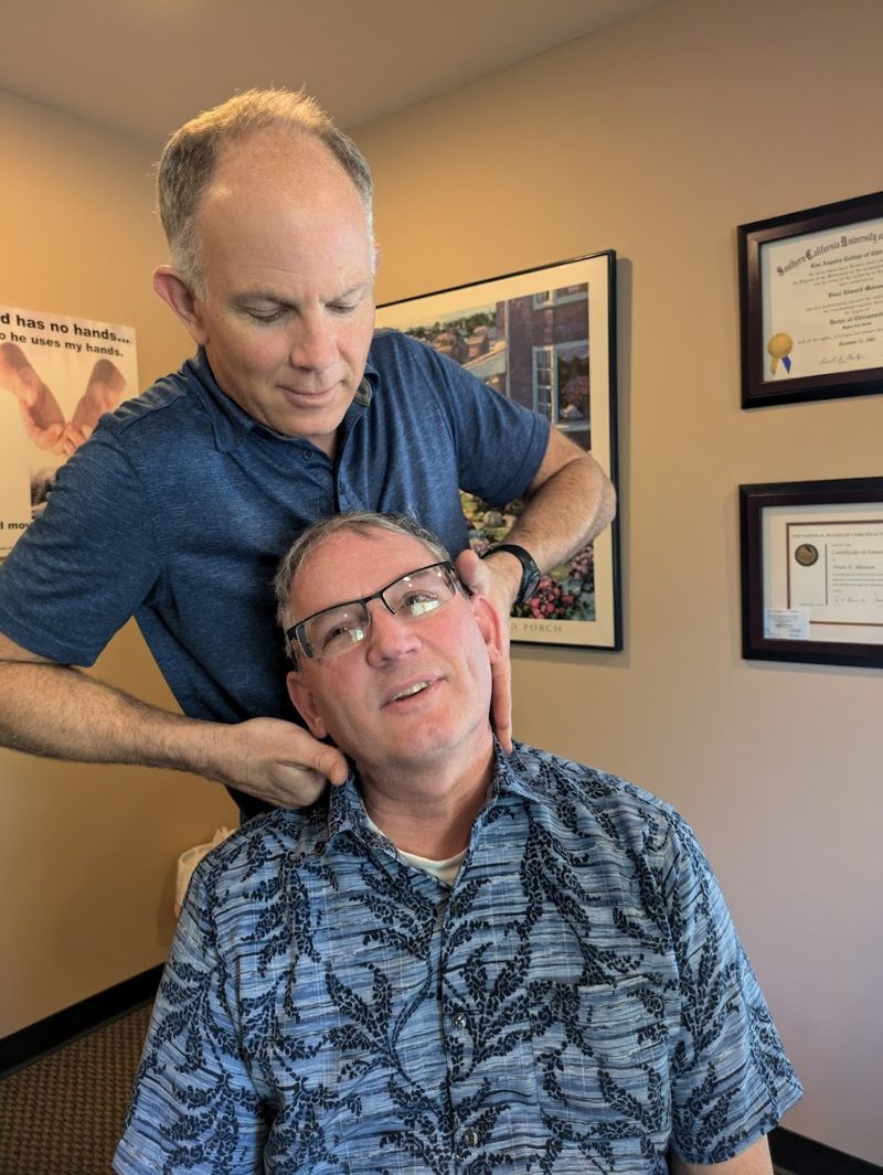 Patient consultation with chiropractor in Olympia